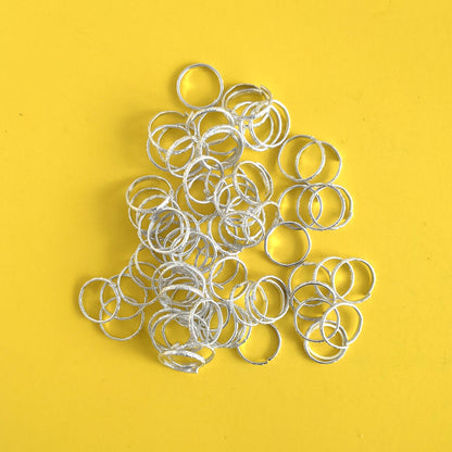 Plastic adjustable silver rings